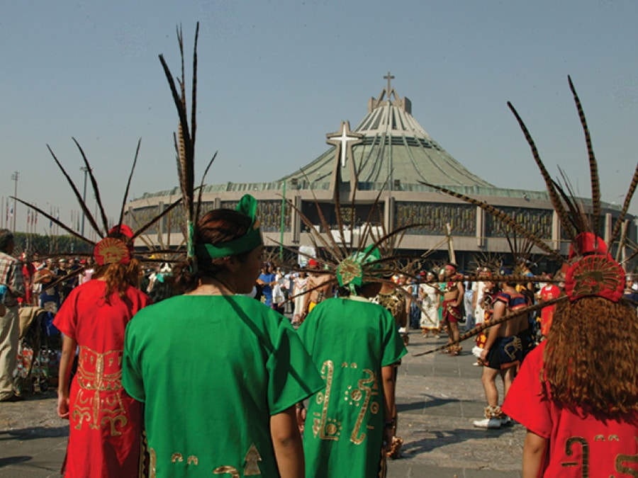 The connection between indigenous heritage and the Marian apparitions is strong, as evidenced by pilgrims wearing traditional indigenous clothing.