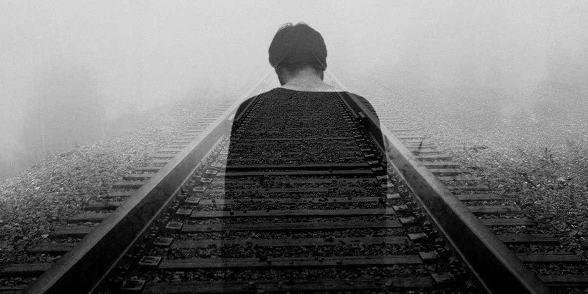 man and train track