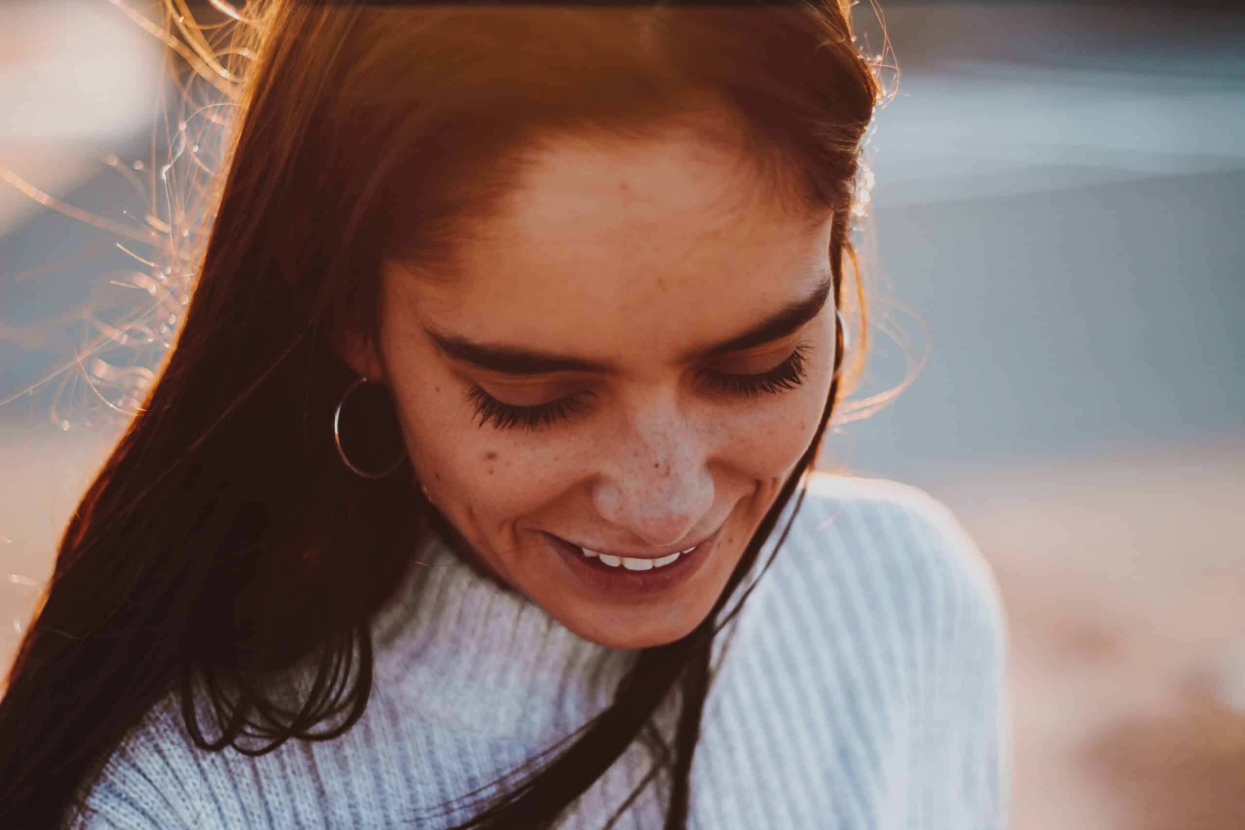 woman smiling |Photo by Yuvraj Singh on Unsplash