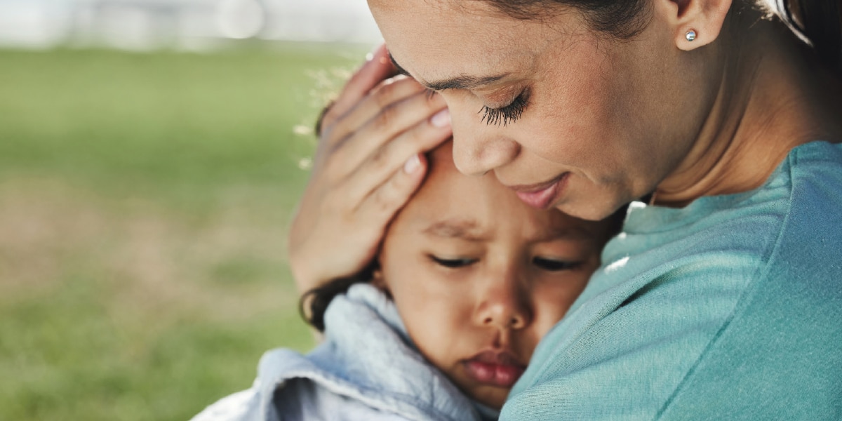 Mother hugging a child