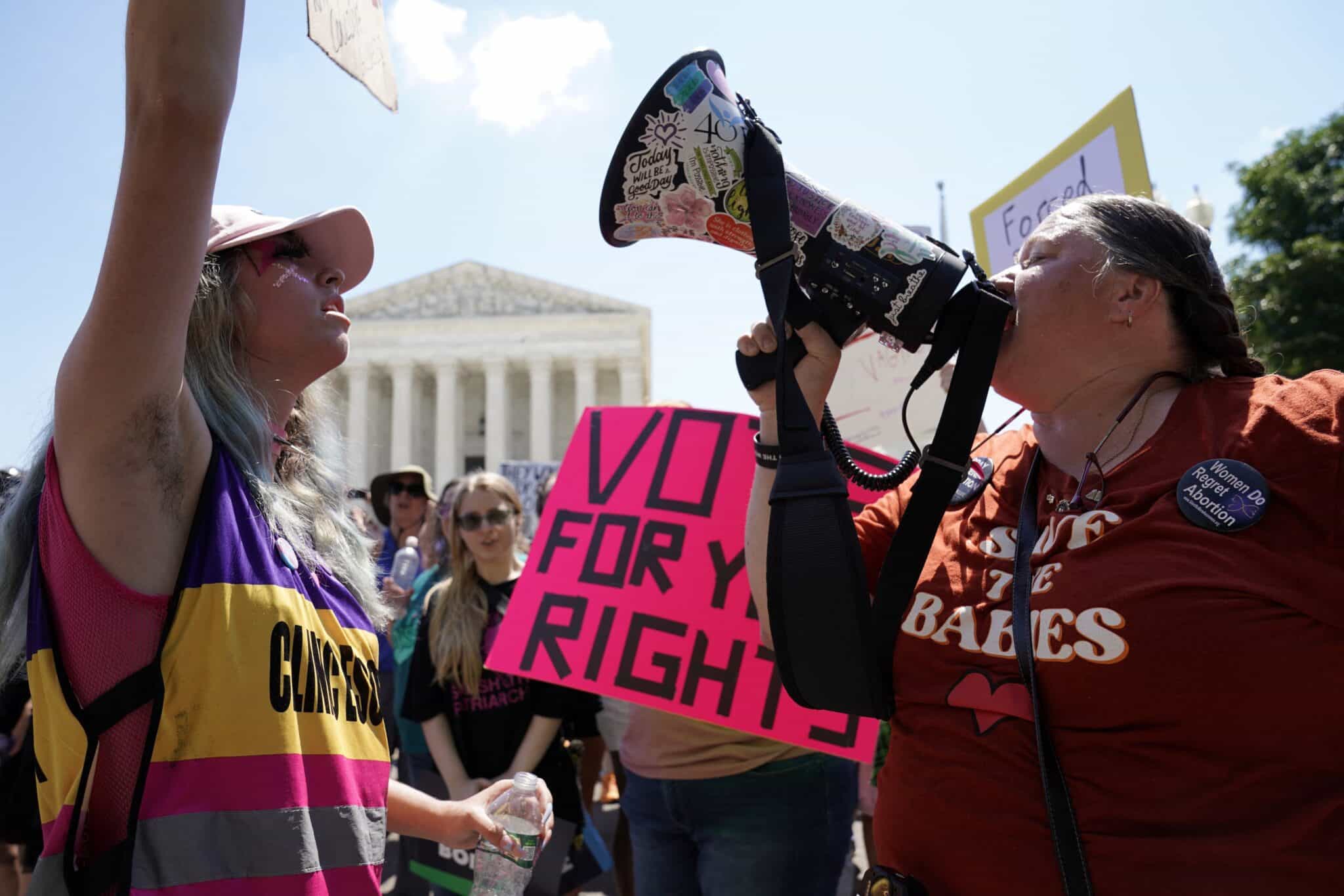 Demonstrators protest outside the U.S. Supreme Court in Washington June 25, 2022, the day after the high court ruled in the Dobbs v Women's Health Organization abortion case, overturning the landmark Roe v. Wade abortion decision. (OSV News photo/Elizabeth Frantz, Reuters)