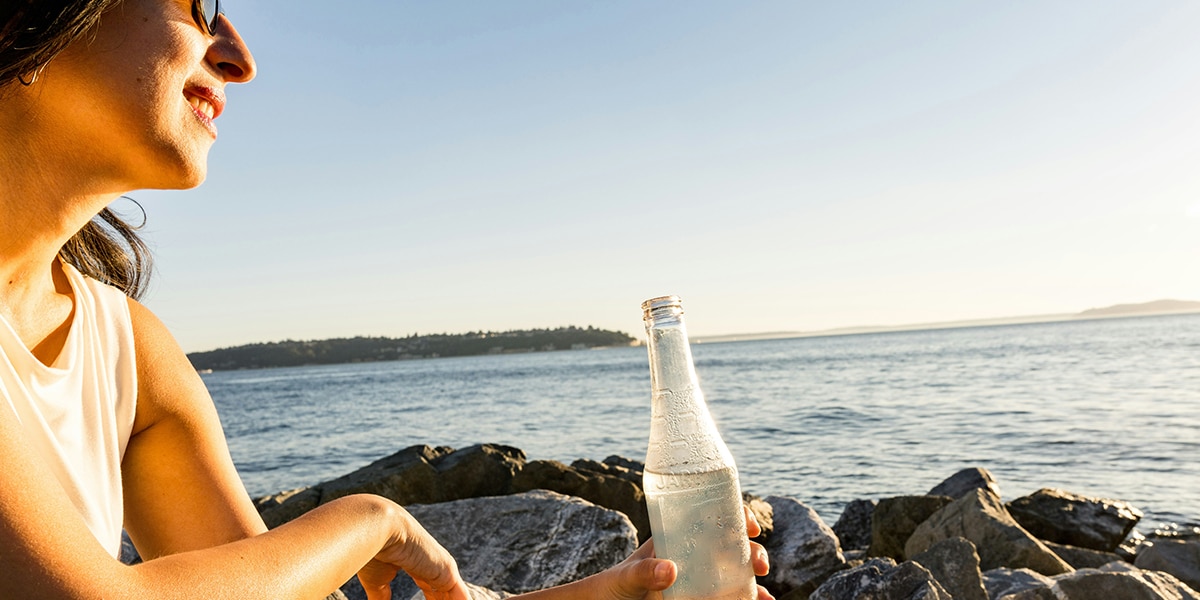 woman holding a bottle of water