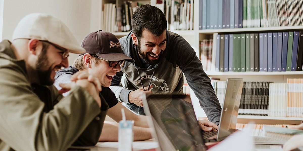 Three man working together in an office.