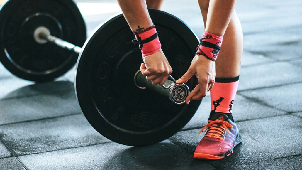 woman training with weights