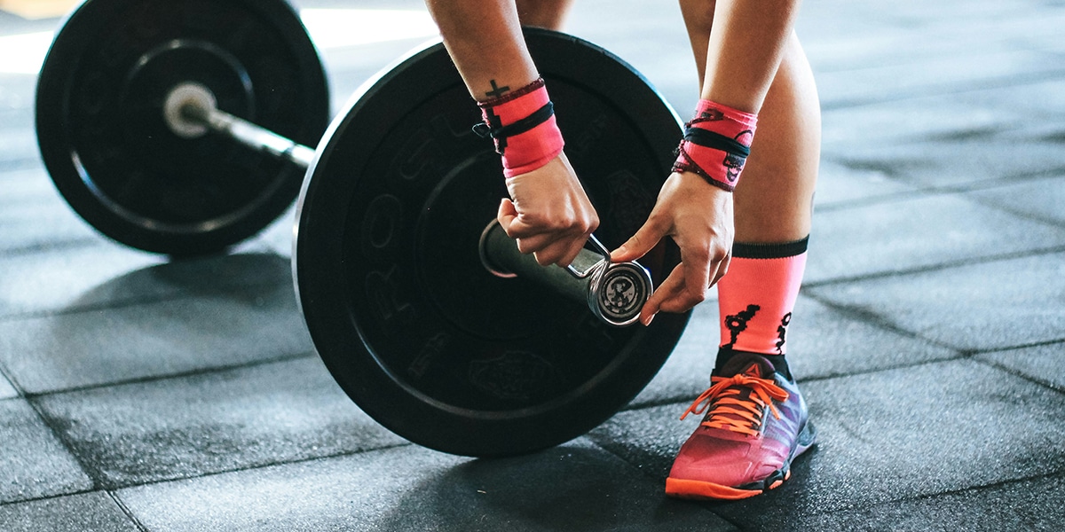 woman training with weights