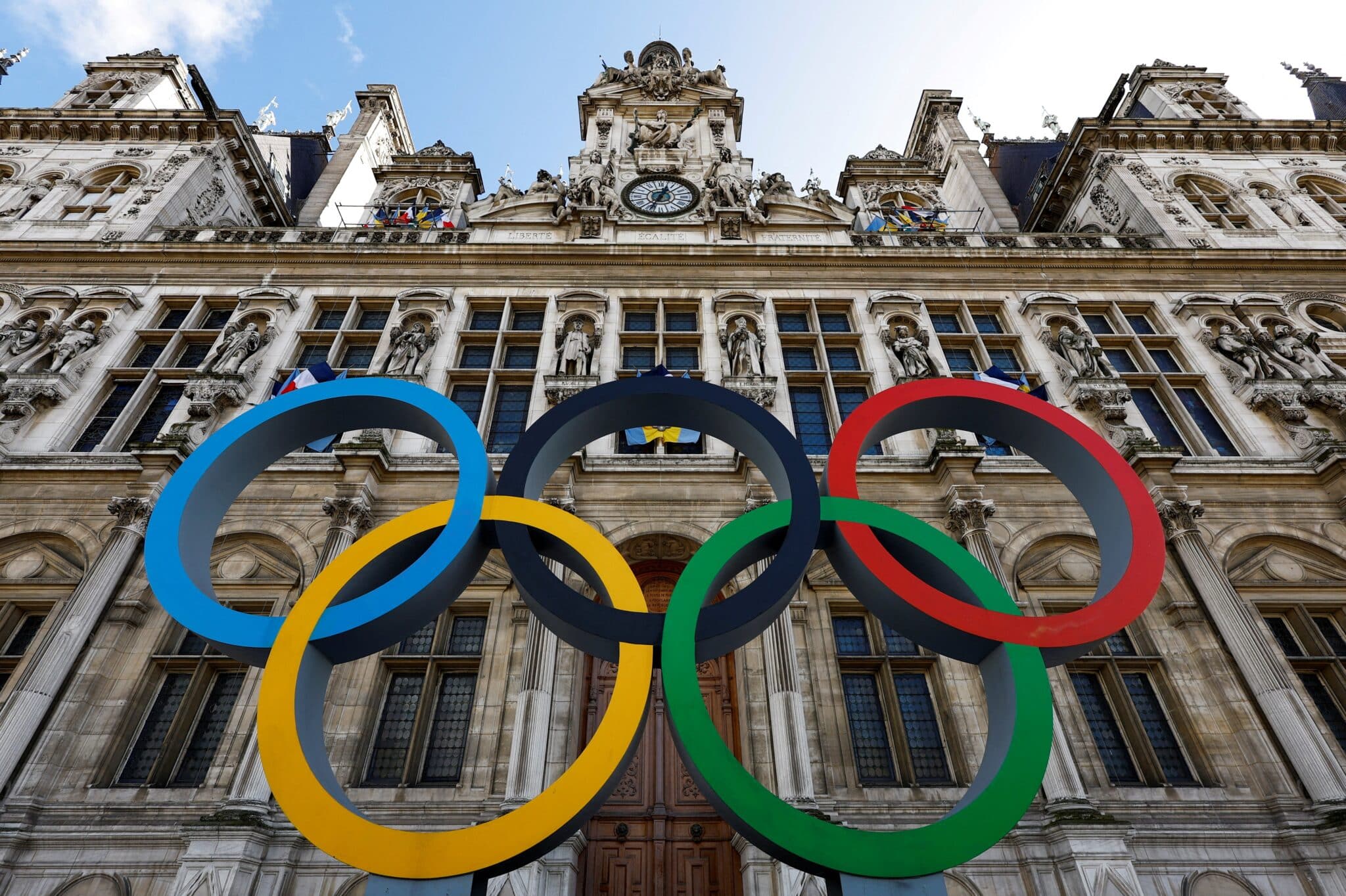 The Olympic rings are seen in front of the Hotel de Ville City Hall in Paris March 14, 2023. The Olympics will take place July 26 - Aug. 11. (OSV News photo/Gonzalo Fuentes, Reuters)