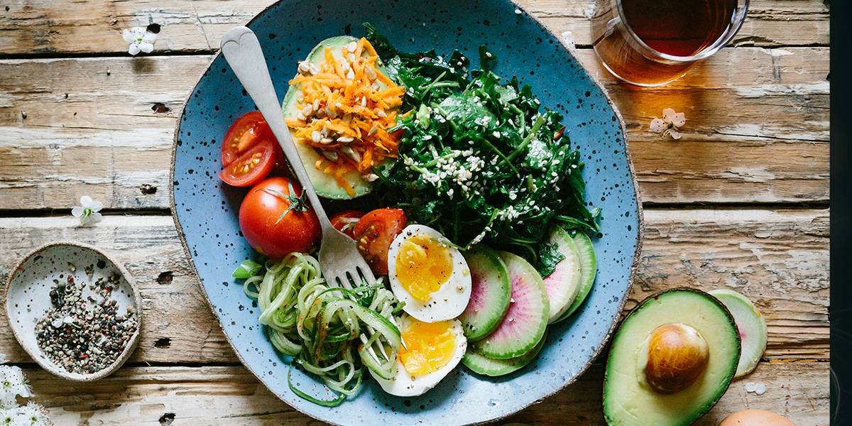 a plate of healthy vegetables and salads.