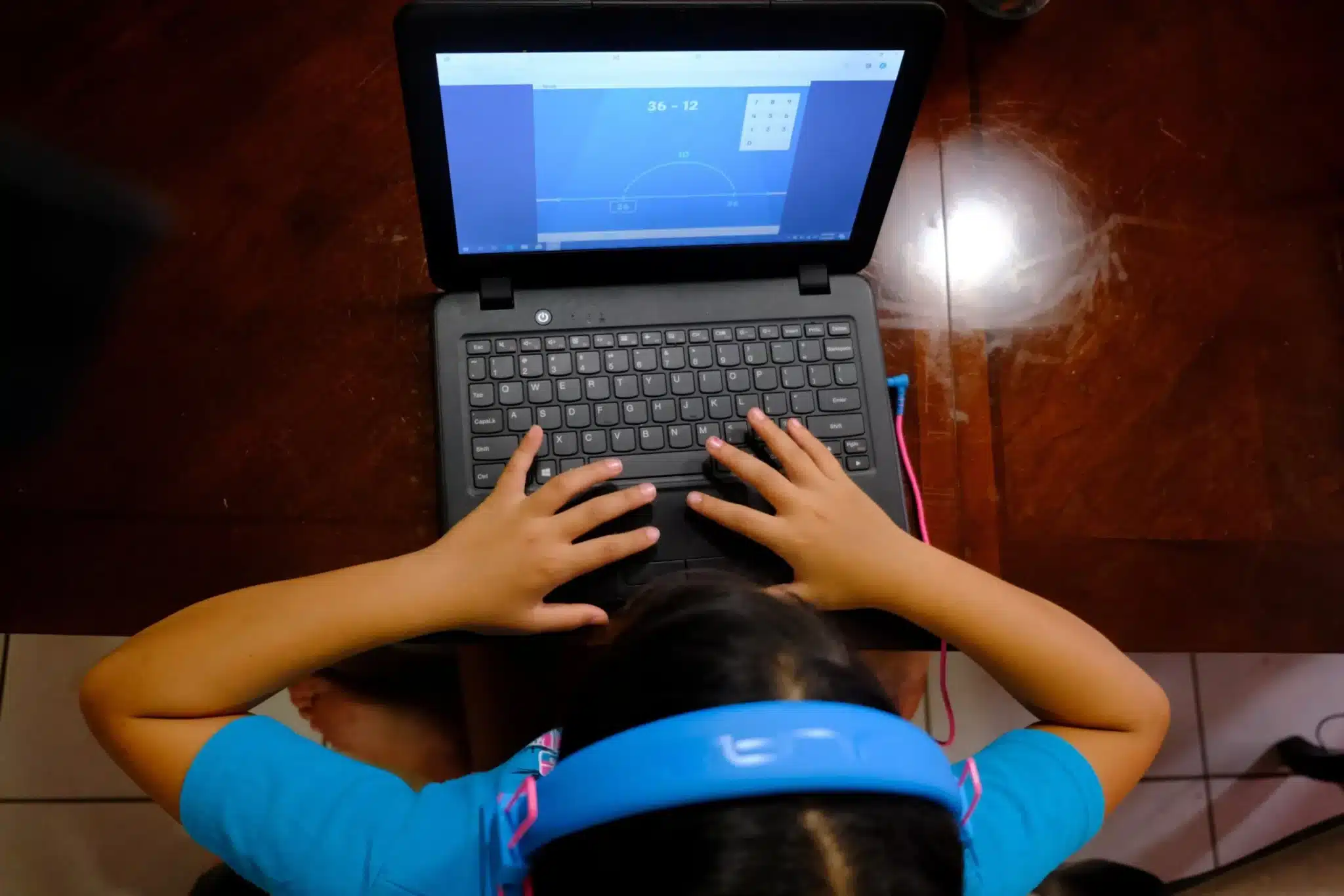 A student completes a math assessment on her computer in her Broward County, Fla., home May 29, 2020, during the COVID-19 pandemic. (OSV News photo/Maria Alejandra Cardona, Reuters)