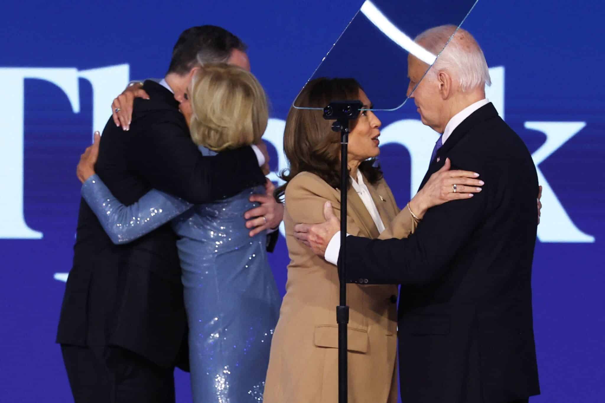 President Joe Biden, first lady Jill Biden, Democratic presidential candidate and Vice President Kamala Harris and second gentleman Doug Emhoff greet each other on stage during Day 1 of the Democratic National Convention in Chicago Aug. 19, 2024.