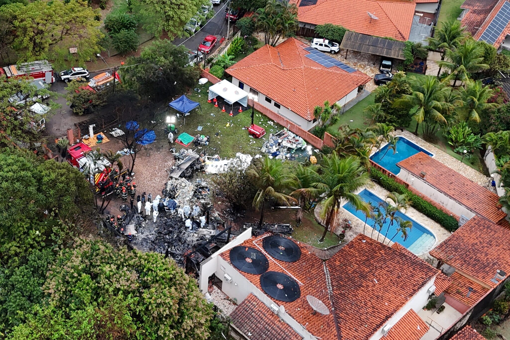 A drone view shows people working at the site of a plane crash in Vinhedo, Sao Paulo, Brazil, August 10, 2024. The Aug. 9 crash killed all 62 passengers on board, greatly touching different Catholic communities in the country. (OSV News photo/Carla Carniel, Reuters)