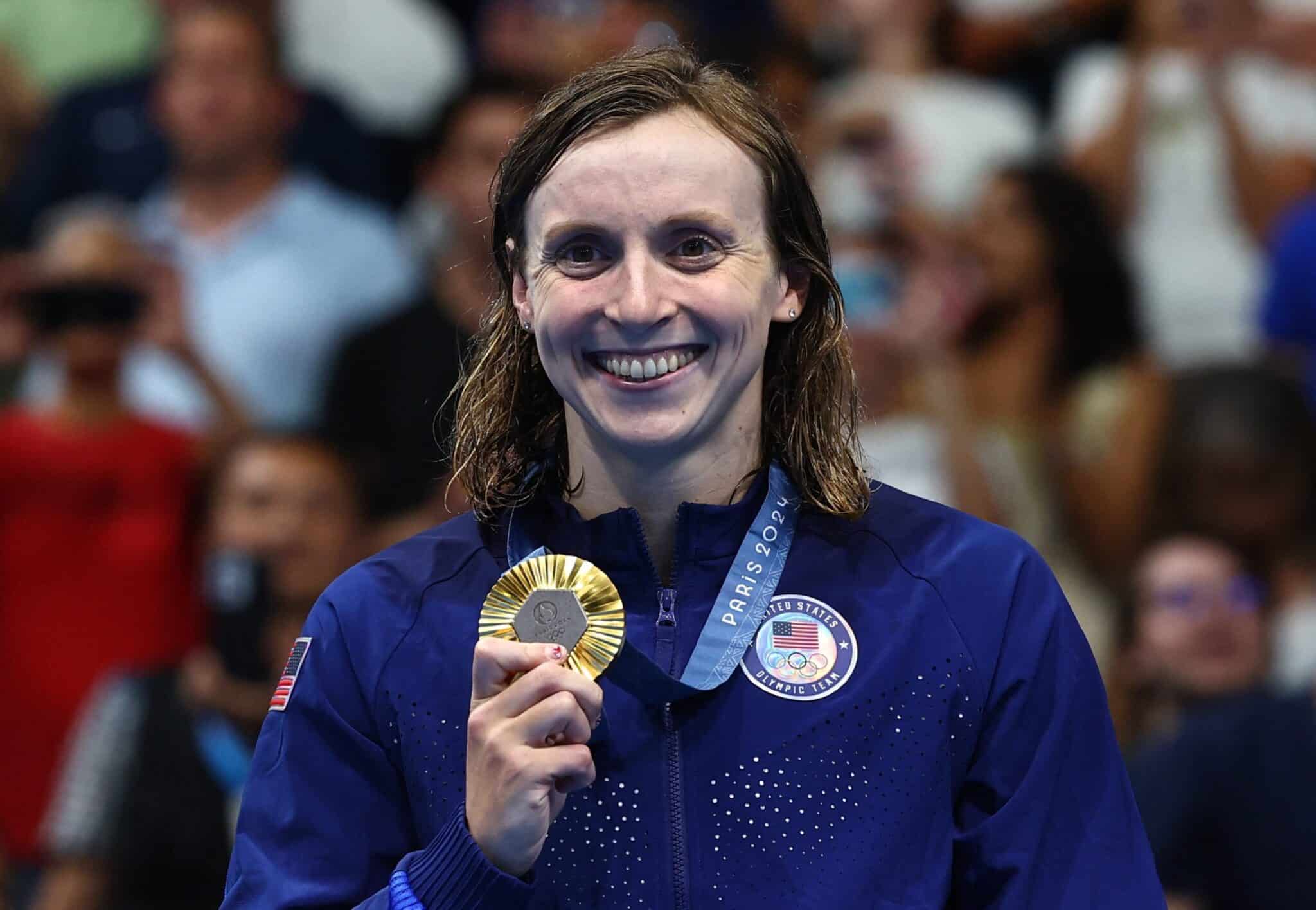 Katie Ledecky of United States celebrates on the podium after wining her ninth Olympic gold medal during the women's 800-meter freestyle Aug. 3, 2024, at Paris La Defense Arena. Ledecky is a graduate of Stone Ridge School of the Sacred Heart in Bethesda, Md.