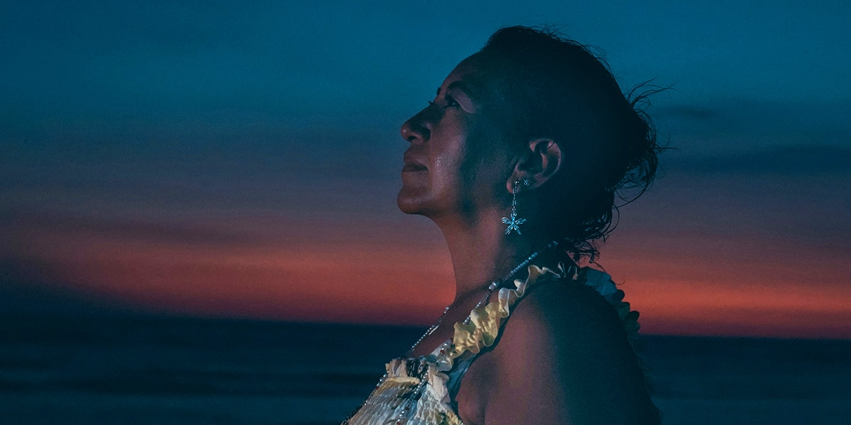 woman looking into night sky