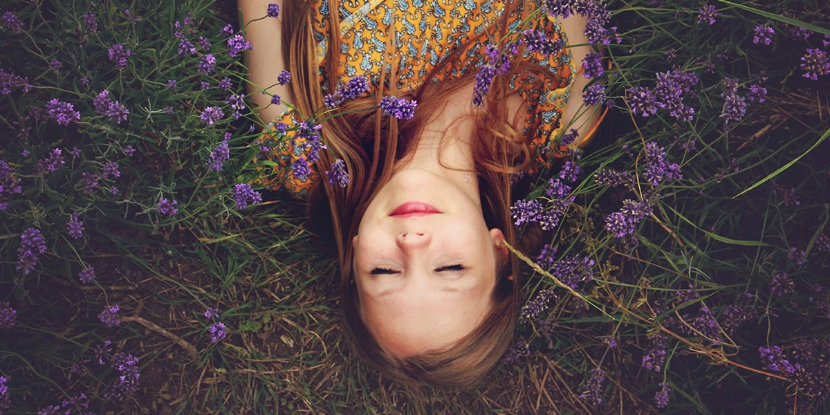 woman laying down, breathing peacefully