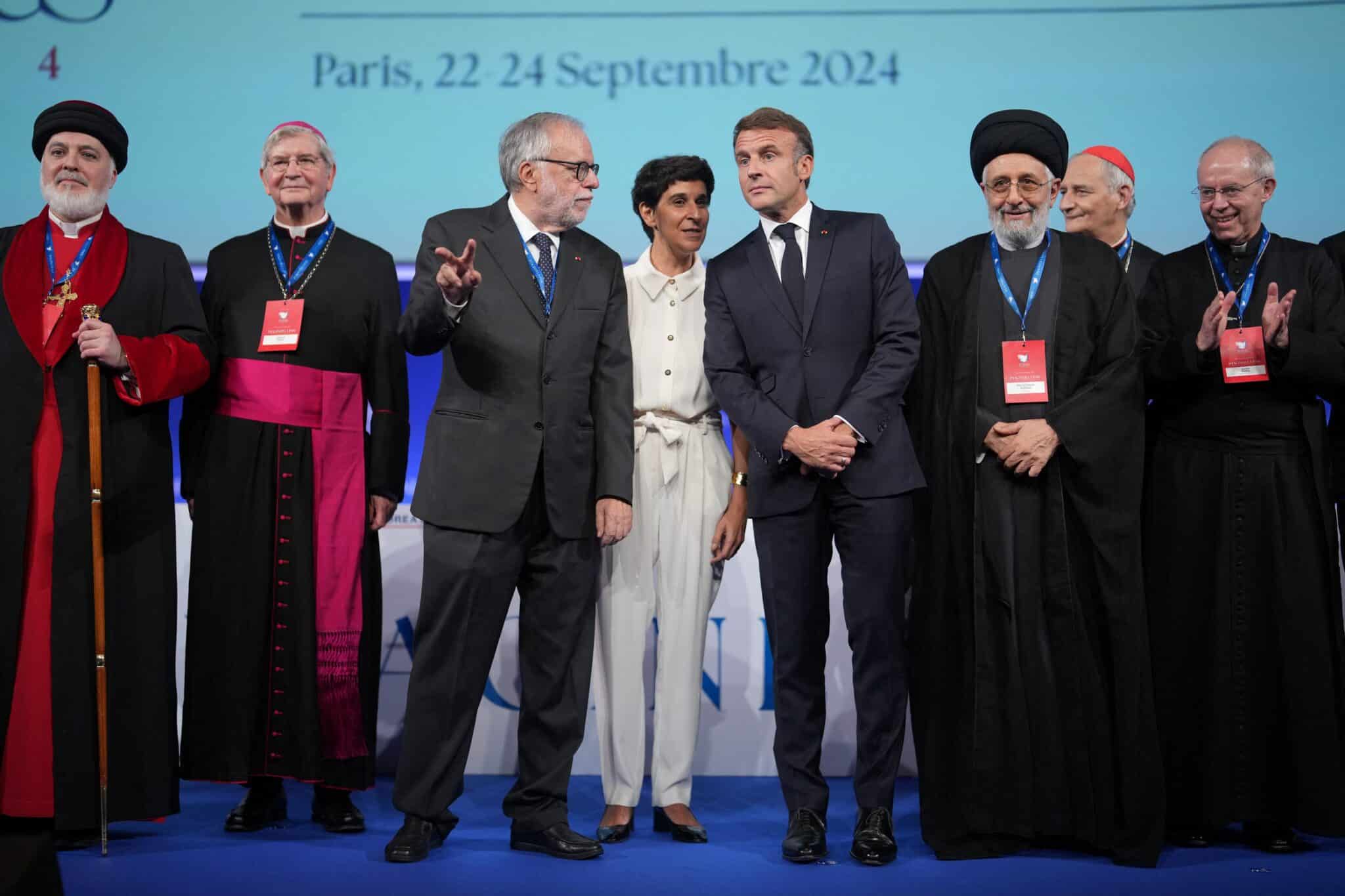 French President Emmanuel Macron and Andrea Riccardi, founder of the Catholic Community of Sant'Egidio pose for a photo Sept. 22, 2024, during 38th "International Meeting for Peace" in Paris. (OSV News photo/Thibault Camus, pool via Reuters)