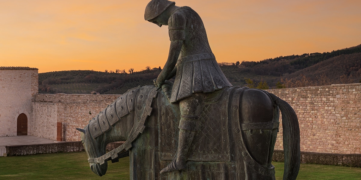 A statue of St. Francis of Assisi on a horse as a young soldier