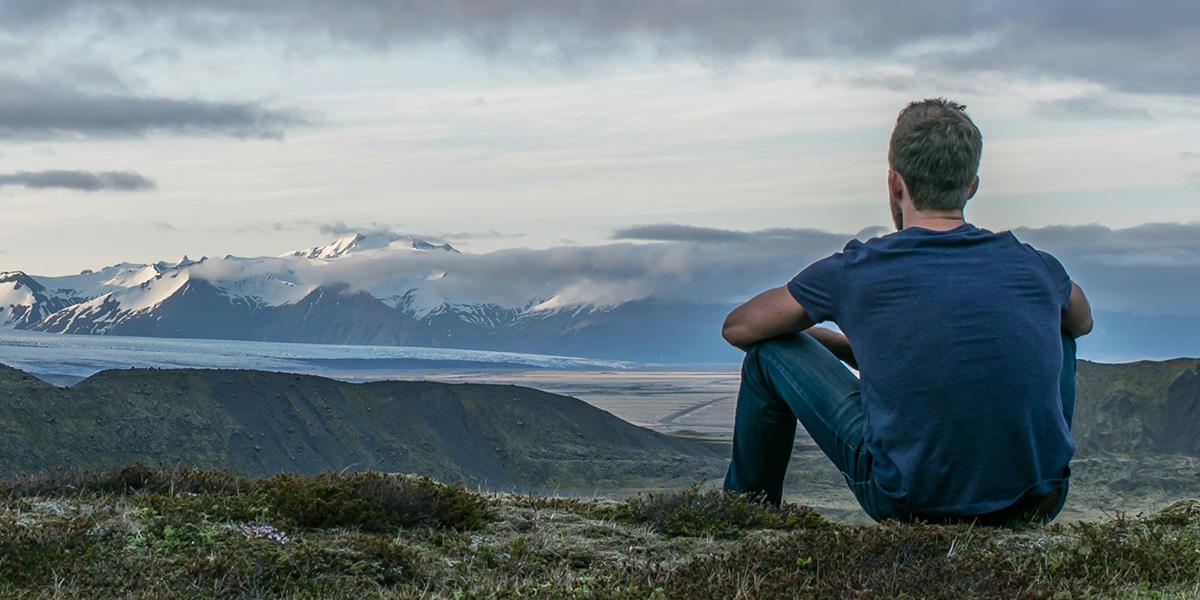 a man enjoying the view in the great outdoors.