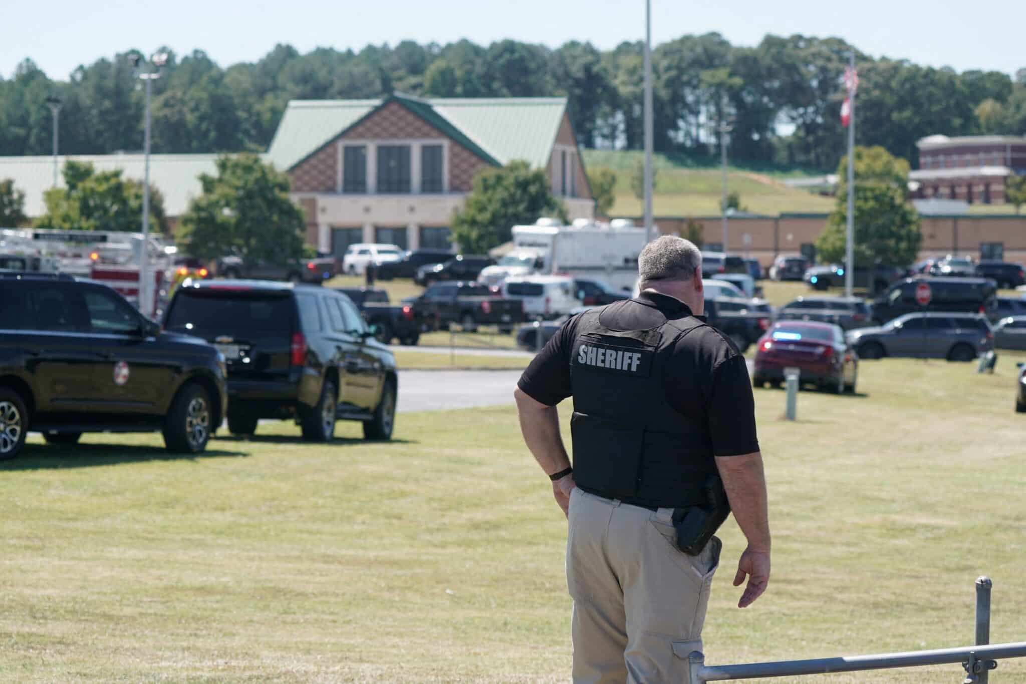 A law enforcement officer works near the scene of a shooting at Apalachee High School in Winder, Ga., Sept. 4, 2024.