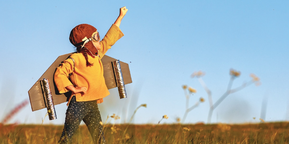 young kid in a field