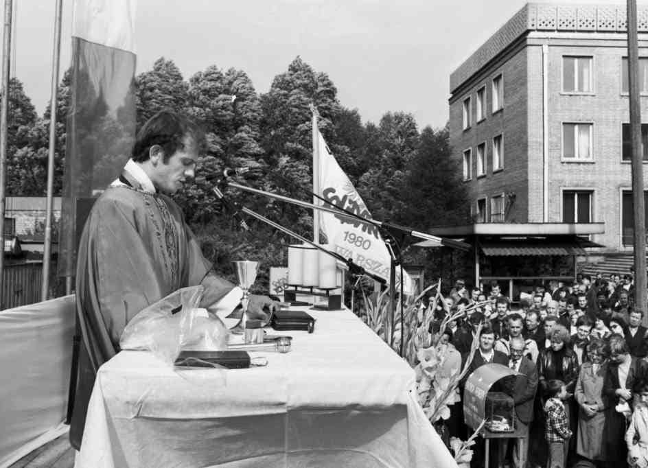 Father Jerzy Popieluszko is seen in an August 1981 photo in Warsaw, Poland, at the Huta Warszawa steelworks, where he served as Solidarity's trade union chaplain. Father Popieluszko is celebrating Mass marking the first aniversary of the August 1980 protest in Huta Warszawa. Father Popieluszko was murdered by communist Poland's secret service agents on Oct. 19, 1984. Father Popieluszko was declared blessed in 2010. (OSV News photo/courtesy Institute of National Remembrance IPN)