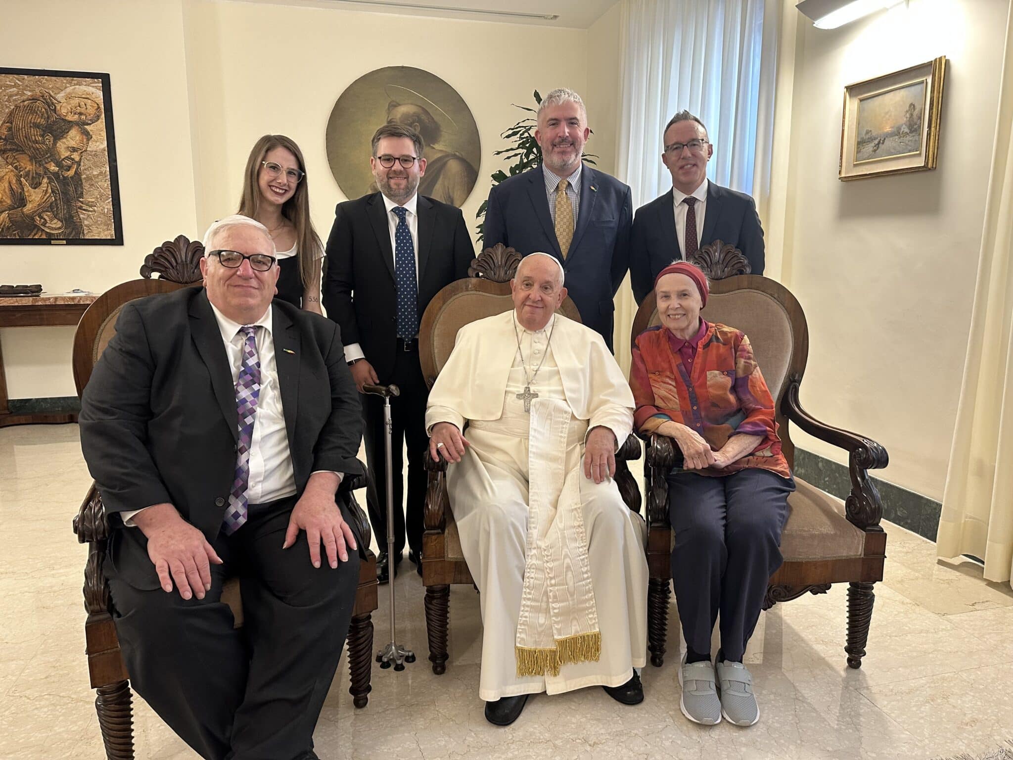 Pope Francis poses for a photo with a delegation from New Ways Ministry, including transgender and intersex Catholics, during a meeting at his residence at the Vatican Oct. 12, 2024. Pictured from left are Francis DeBernardo, Bernadette Donlon, Robert Shine, Matthew Myers, Brian Flanagan and Loretto Sister Jeannine Gramick.(CNS photo/courtesy New Ways Ministry)