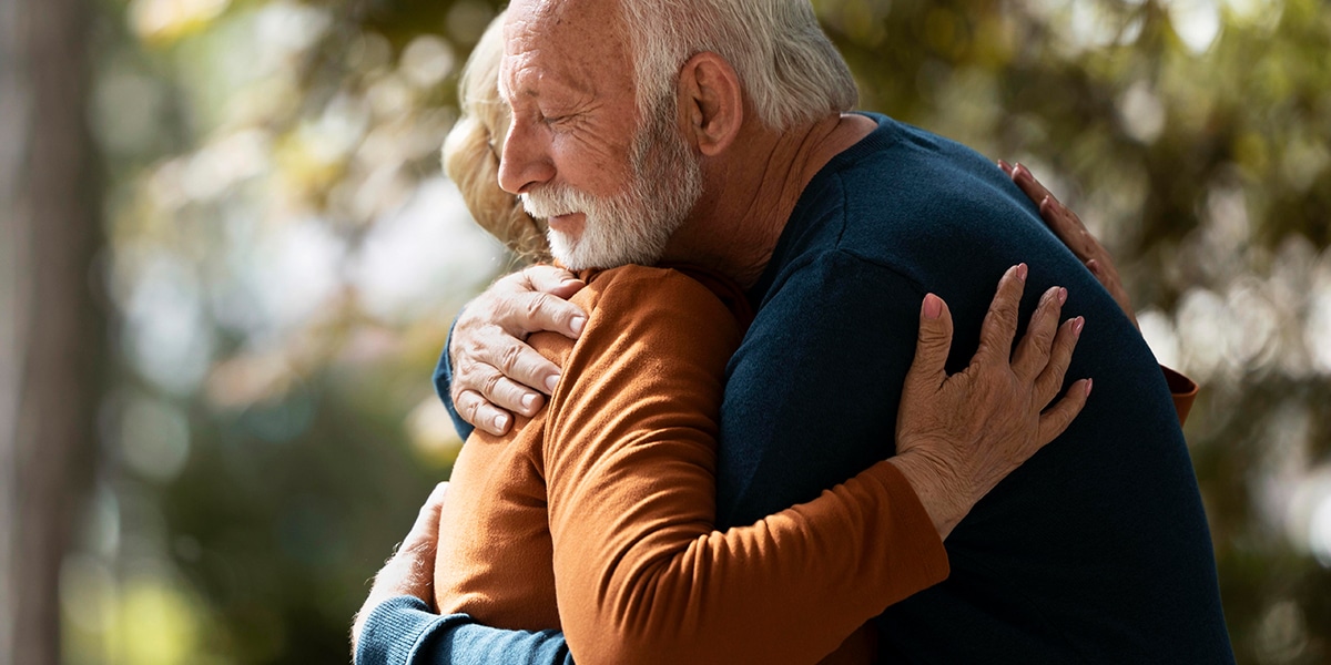 couple hugging and forgiving each other