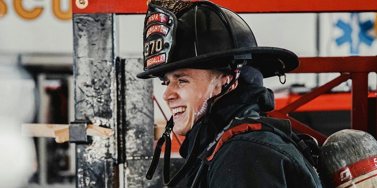 Fireman in full gear with helmet