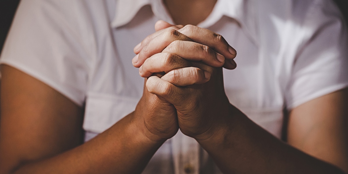 hands folded in prayer