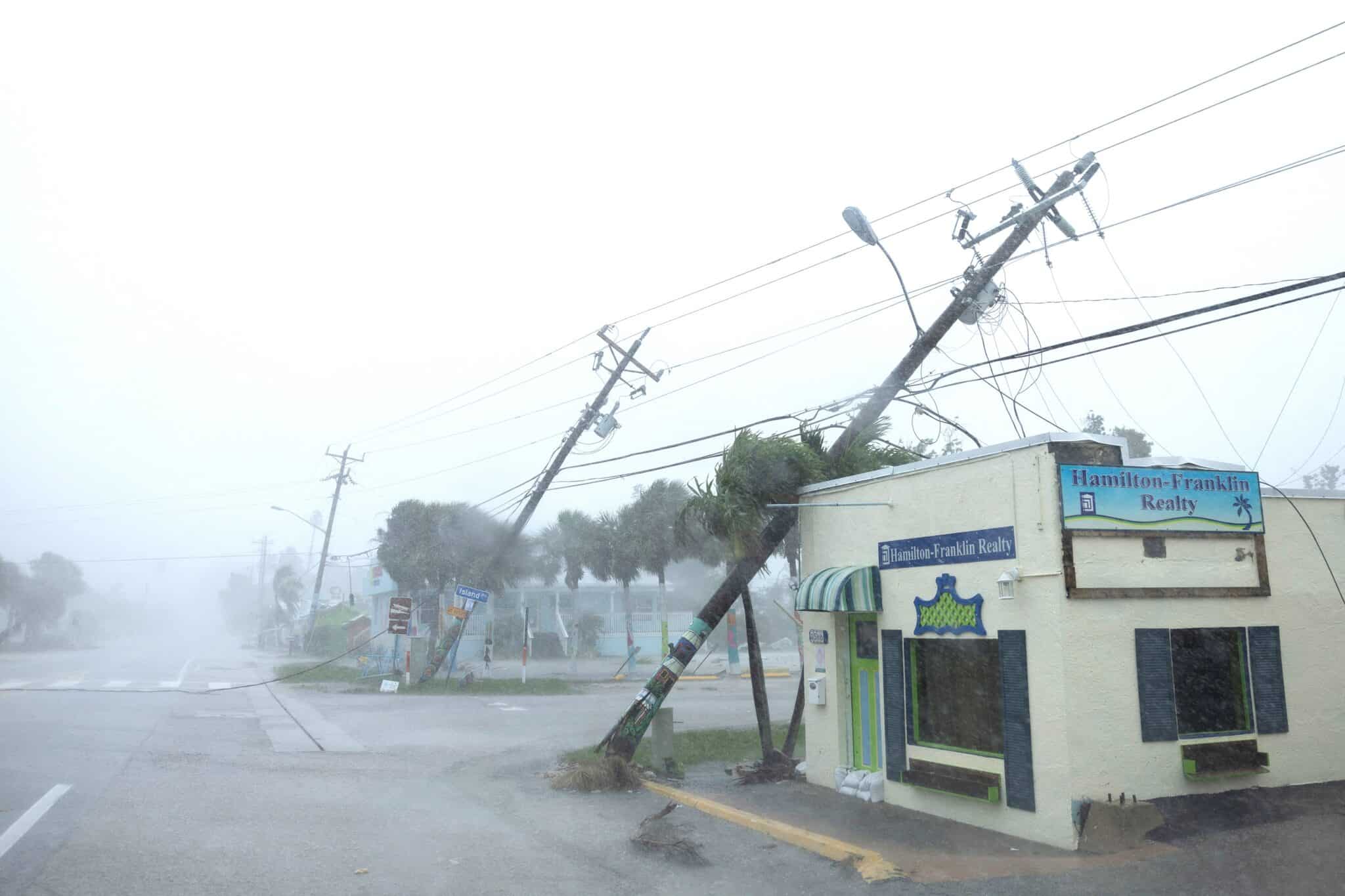 Broken utility poles downed by strong wind gusts are seen as Hurricane Milton approaches Fort Myers, Fla., Oct. 9, 2024. As Hurricane Milton bears down on Florida just days after Hurricane Helene, Catholic Charities USA announced Oct. 9 that it has launched a dedicated disaster relief donation campaign at ccusa.online/milton, with 100% of all funds raised to be allocated to local Catholic Charities agencies. (OSV News photo/Ricardo Arduengo, Reuters)