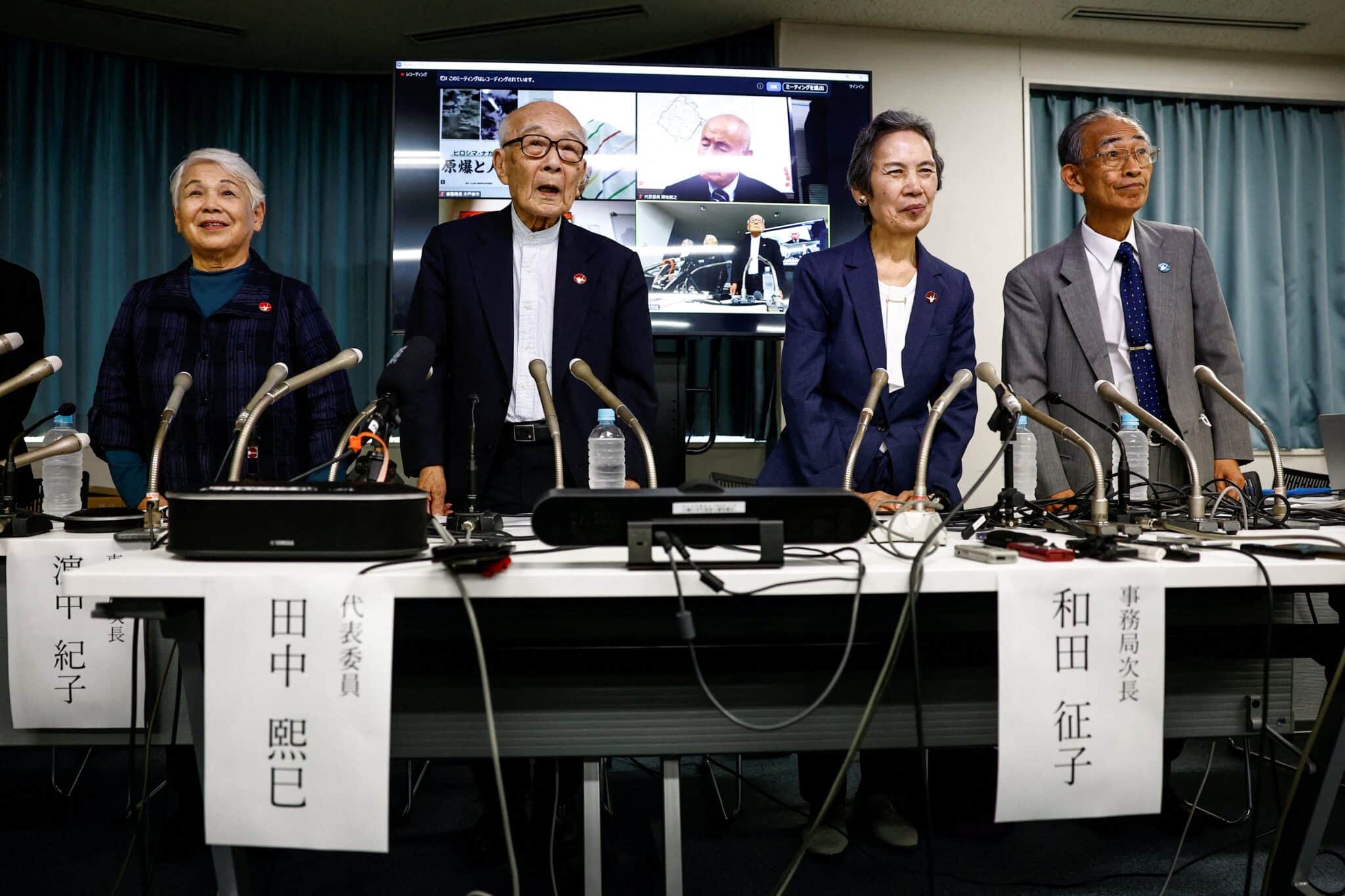 Atomic bomb survivors and members of Nihon Hidankyo, a country-wide organization of atomic and hydrogen bomb sufferers, including Nihon Hidankyo Assistant Secretary General Toshiko Hamanaka, Co-chairperson Terumi Tanaka, Assistant Secretary General Masako Wada, Assistant Secretary General Jiro Hamasumi attend a press conference on the following day of the group winning the 2024 Nobel Peace Prize