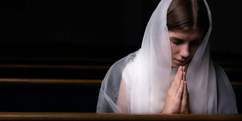 young woman praying