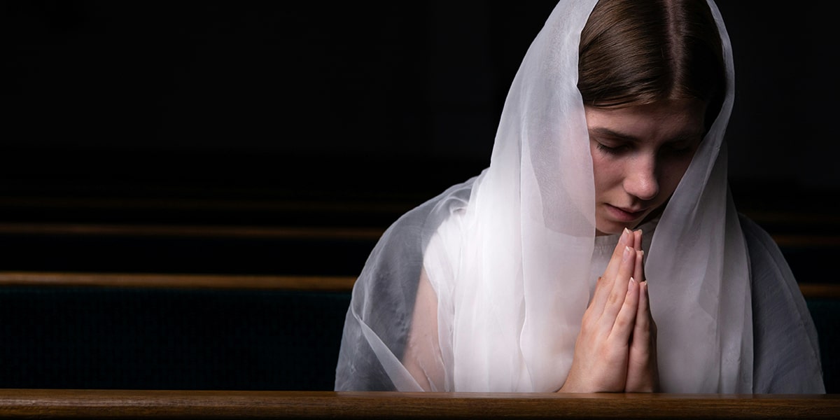 young woman praying