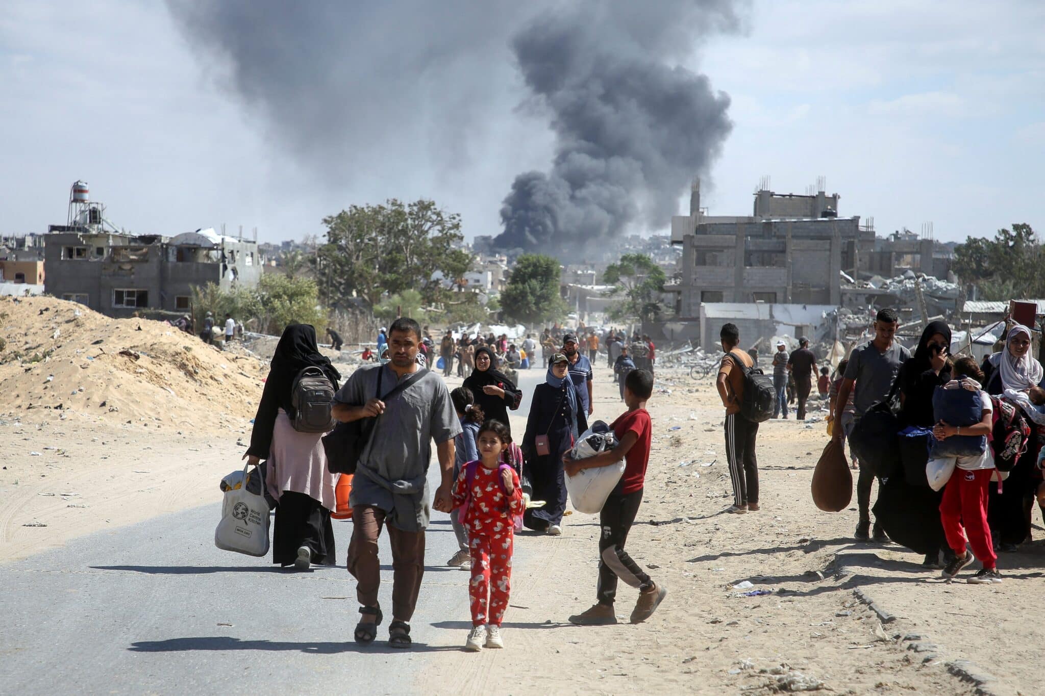 Smoke rises following an Israeli airstrike as displaced Palestinians make their way to flee areas in the eastern part of Khan Younis following an Israeli evacuation order, amid the ongoing Israel-Hamas war, in Khan Younis in the southern Gaza Strip Oct. 7, 2024. (OSV News photo/Hatem Khaled, Reuters)