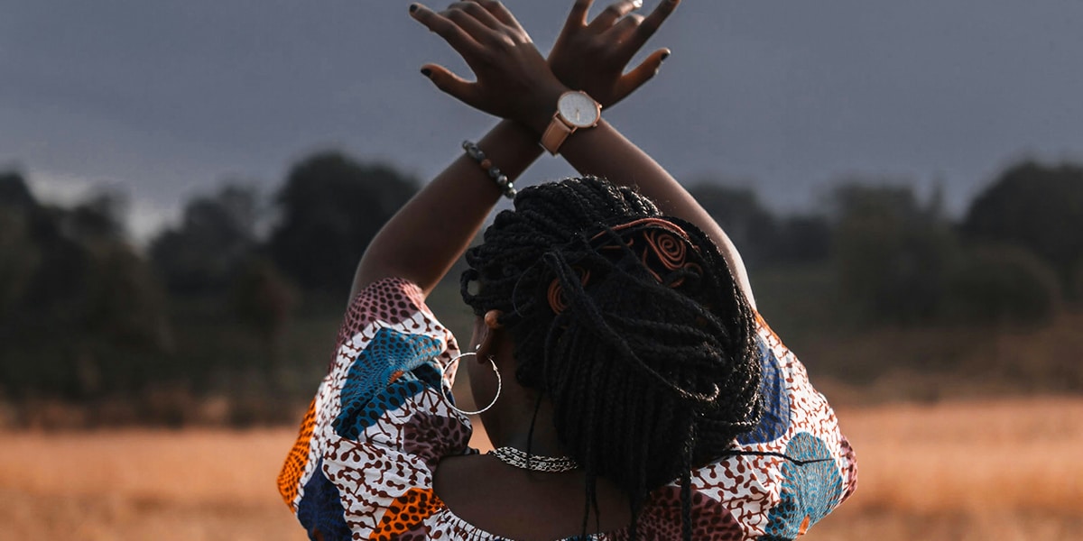 African American woman dressed in traditional African clothes