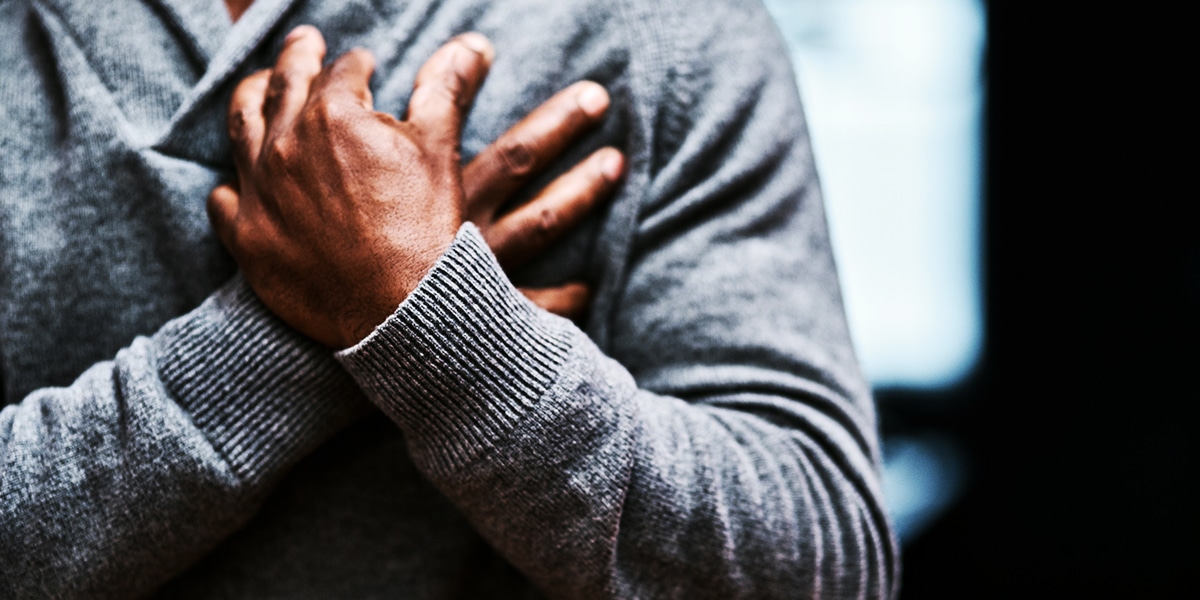 hands crossed over heart in sign of humility