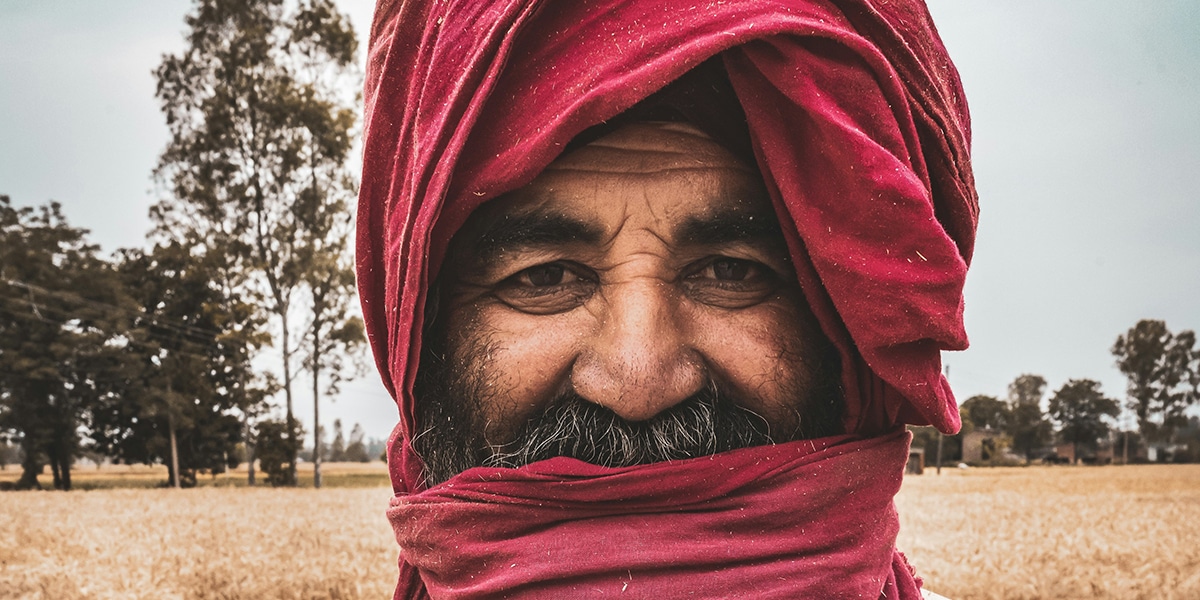 man wearing a red face covering