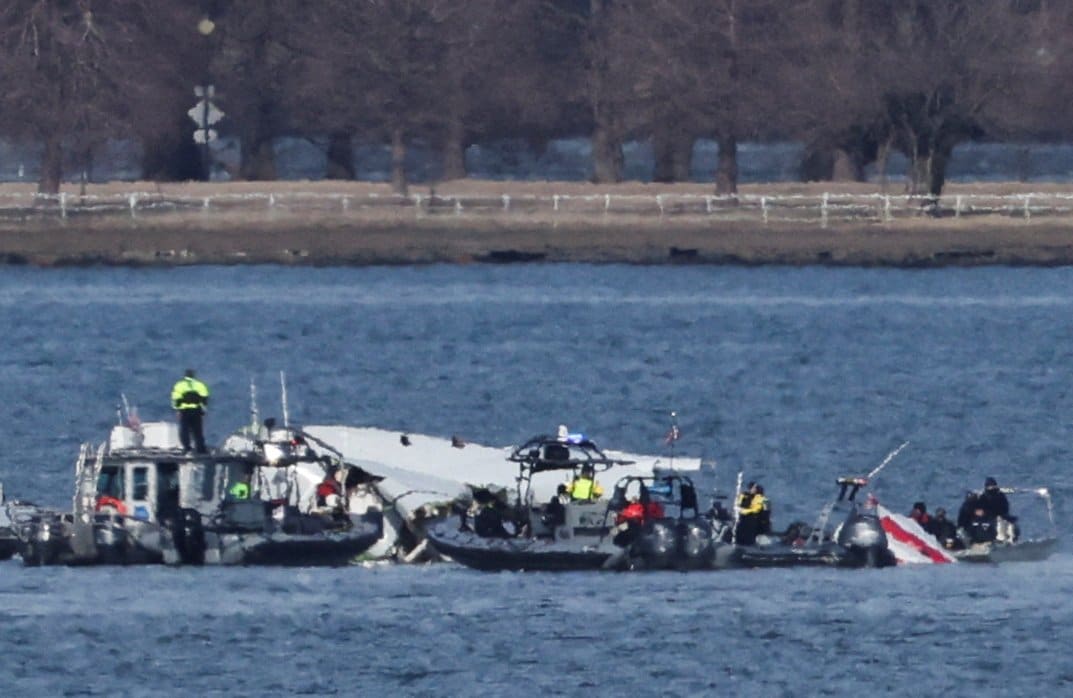 Emergency workers recover debris from the Potomac River in Washington Jan. 30, 2025, after American Eagle flight 5342 collided in midair with a Black Hawk Army helicopter late Jan. 29 while on approach for landing at Ronald Reagan Washington National Airport.