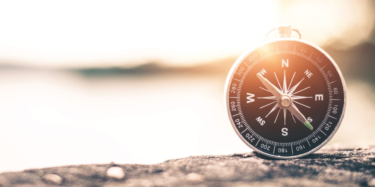 compass on a rock