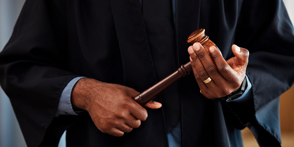 judge holding a gavel in his hands