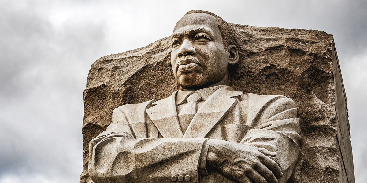 a stone monument depicting Martin Luther King Jr.