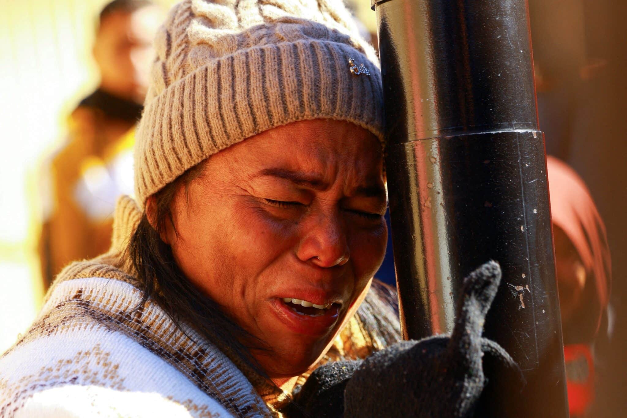 Margelis Tinoco, a migrant from Colombia, reacts after receiving news that her U.S. Customs and Border Protection's smartphone application CBP One was cancelled at the Paso del Norte International border bridge in Ciudad Juarez, Mexico, Jan.20, 2025, on Inauguration Day, when Donald Trump was sworn in for his second presidential term. (OSV News photo/Jose Luis Gonzalez, Reuters)