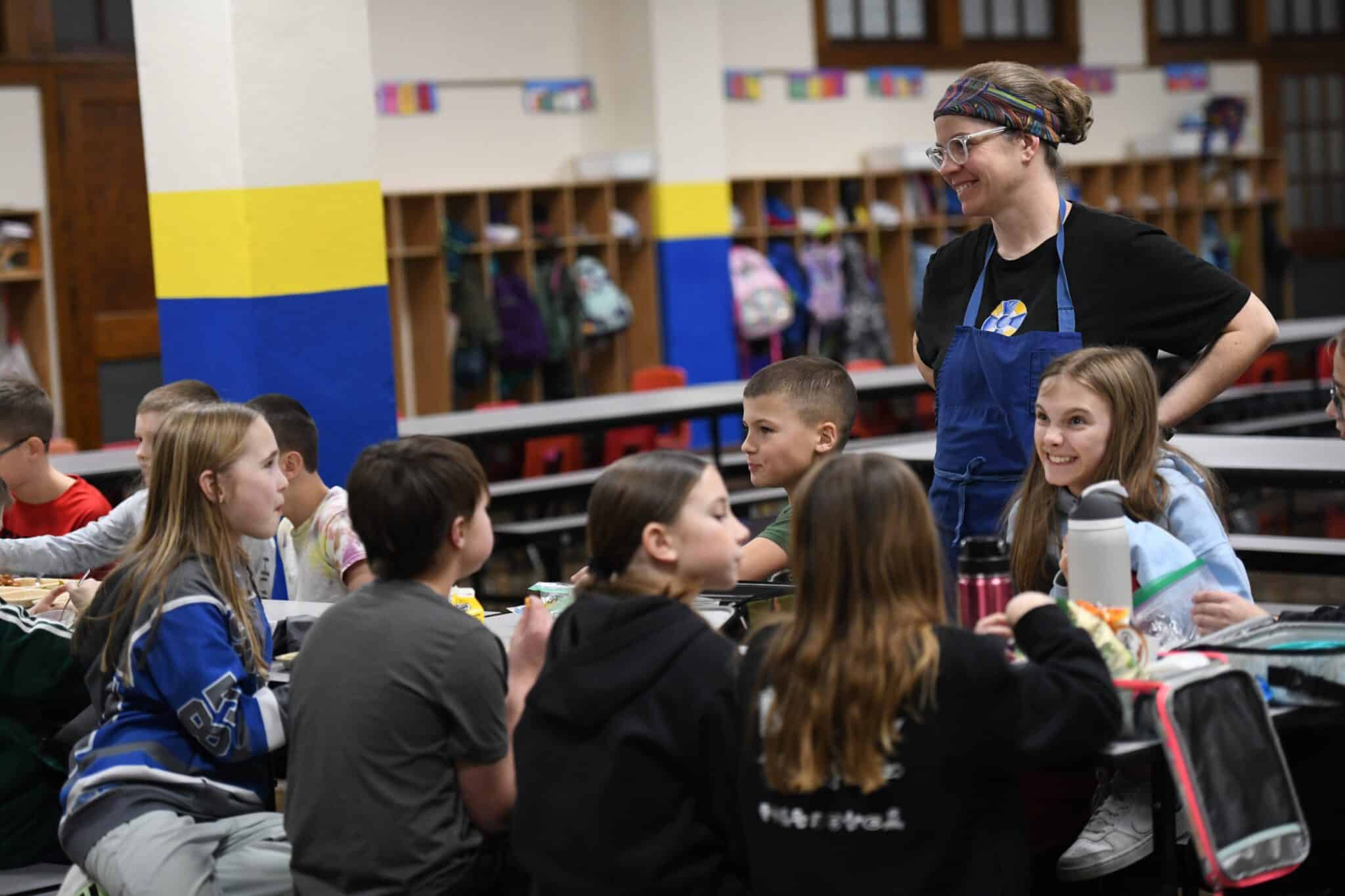 Stephanie Nix, head cook at St. Joseph School in St. Joseph, Minn., helps supervise the last lunch session when she finishes serving Jan. 23, 2025. (OSV News photo/Dianne Towalski, The Central Minnesota Catholic)