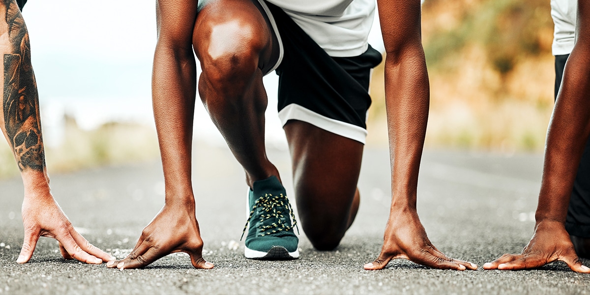 men getting ready to run a race