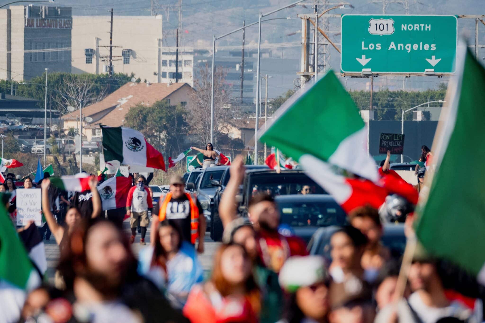 People march along U.S. Route 101 during a protest in Los Angeles Feb. 2, 2025, against arrests and deportations of migrants by U.S. government agencies. (OSV News photo/Joel Angel Juarez, Reuters)