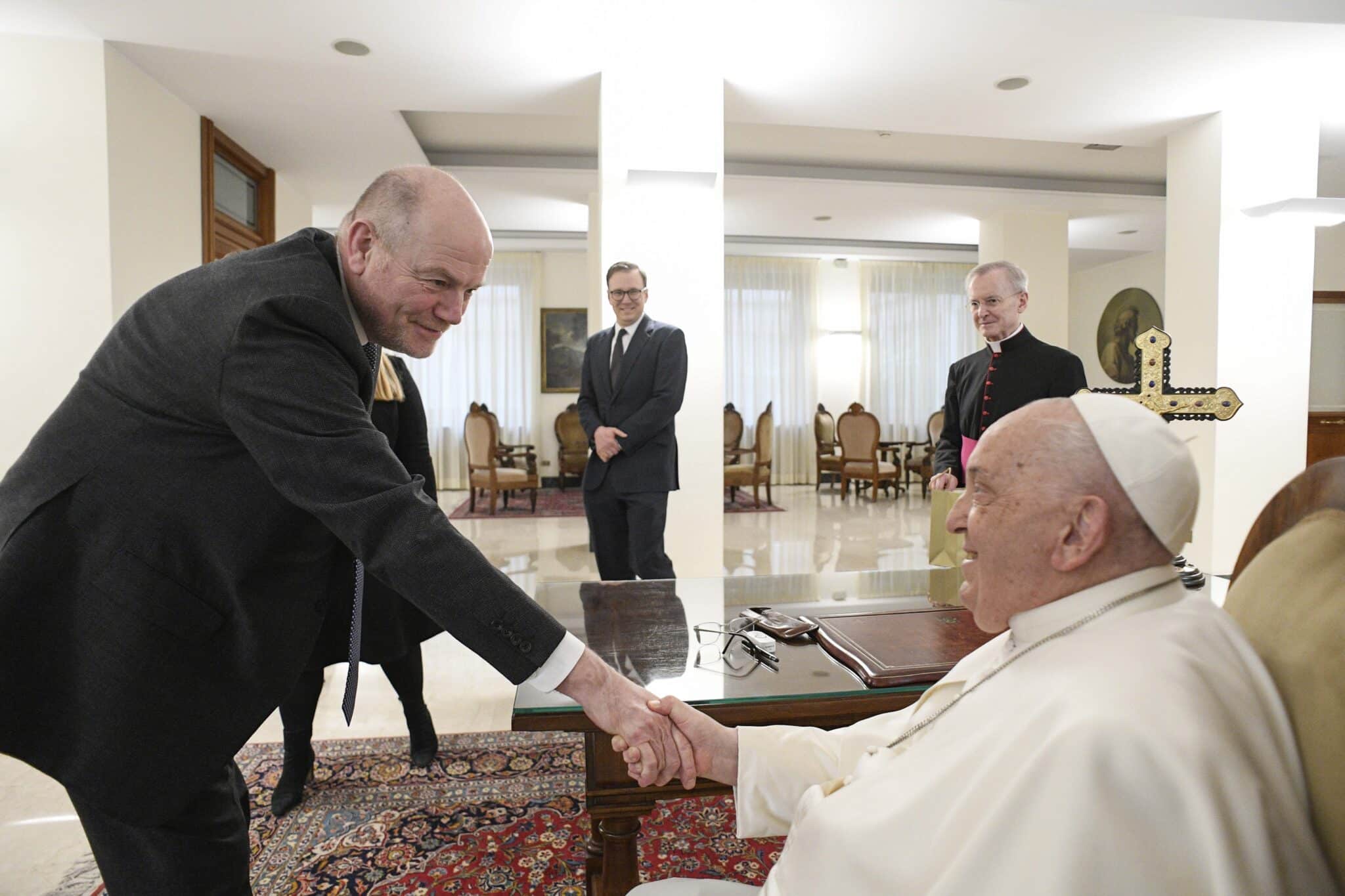 Pope Francis shakes hands with Mark Thompson, chairman and CEO of CNN, at the end of a meeting at his residence, the Domus Sanctae Marthae, before checking into Rome's Gemelli hospital Feb. 14, 2025, for tests and treatment of bronchitis.