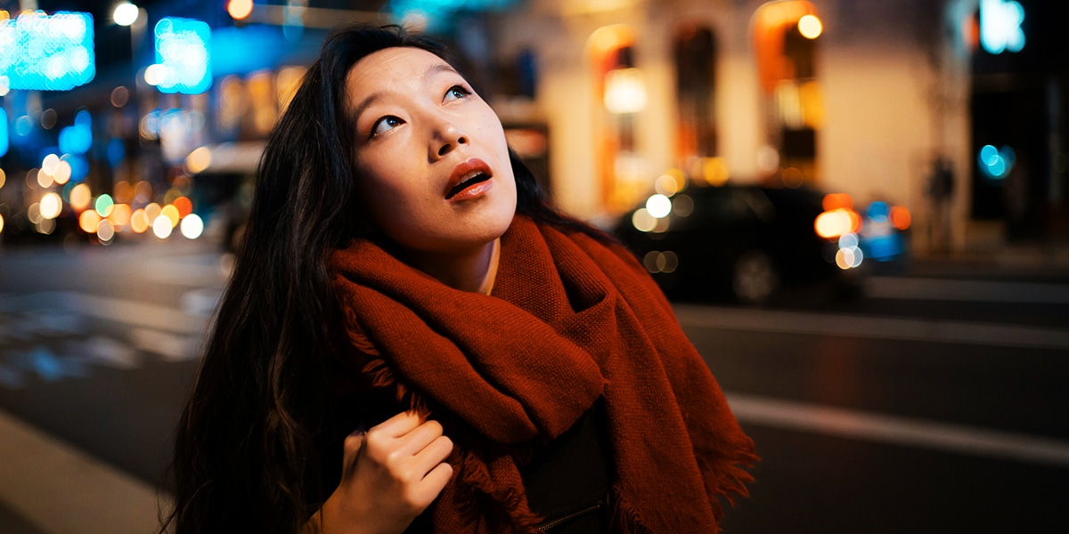 woman looking up in prayer.