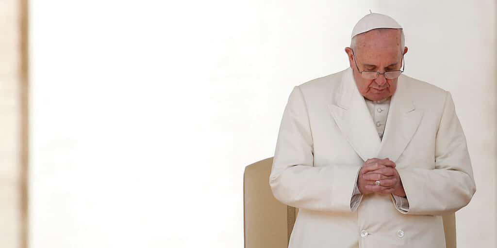 Pope Francis deep in prayer.