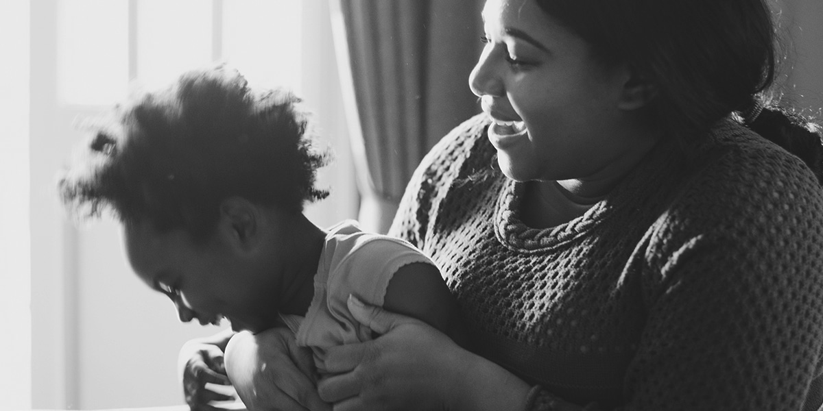 Mother and child laughing