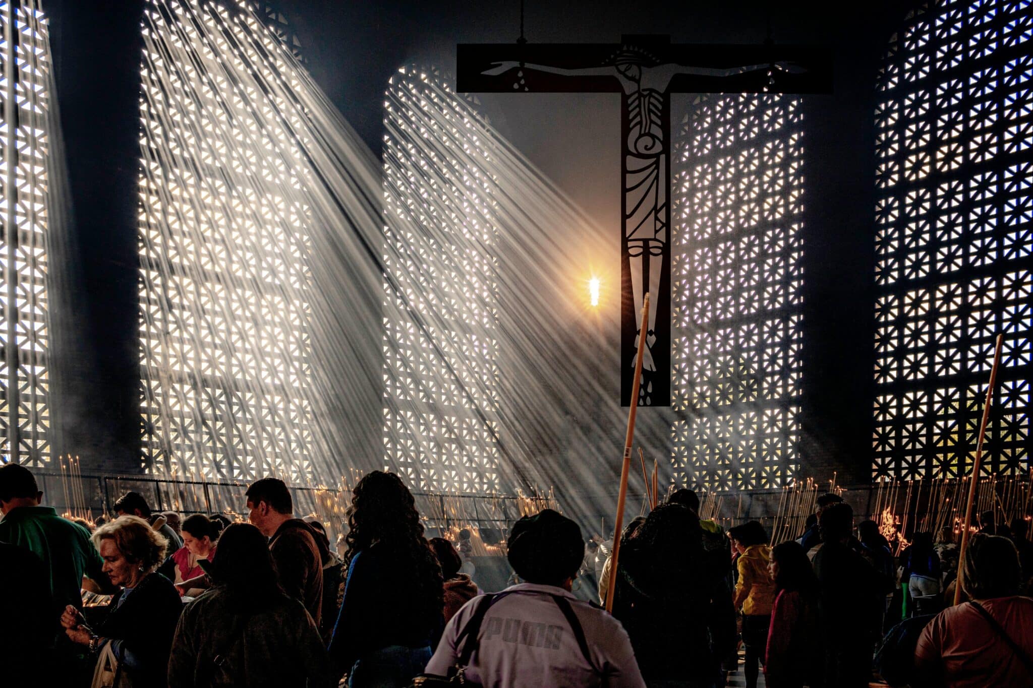 People in a church | Photo by Fabio Akamine via pexels