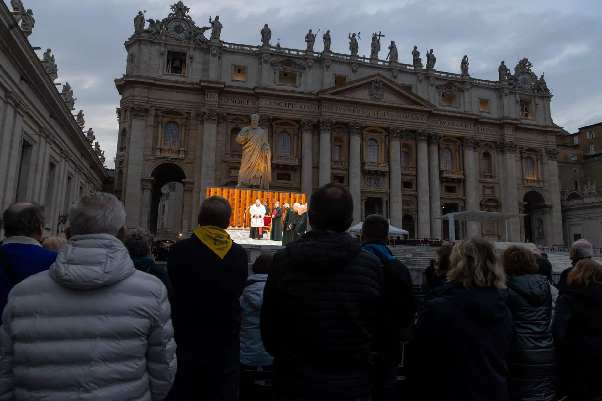 Cardinal Kevin J. Farrell, prefect of the Dicastery for Laity, the Family and Life, is seen on a video screen leading the rosary for Pope Francis at the Vatican March 10, 2025.