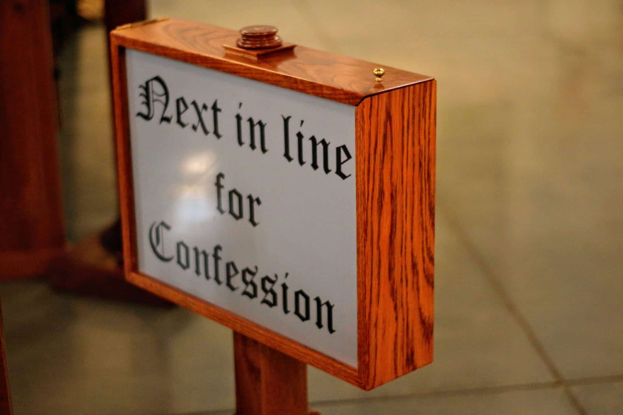 Sign for confession at church | Photo by Shalone Cason on Unsplash